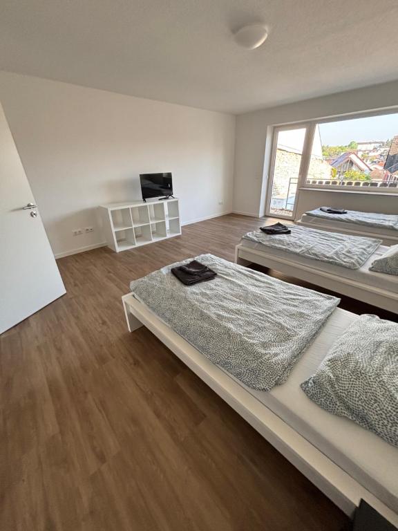 Monteurwohnungen im Weedenhof 55270 Zornheim - Apartamento De Dos Dormitorios