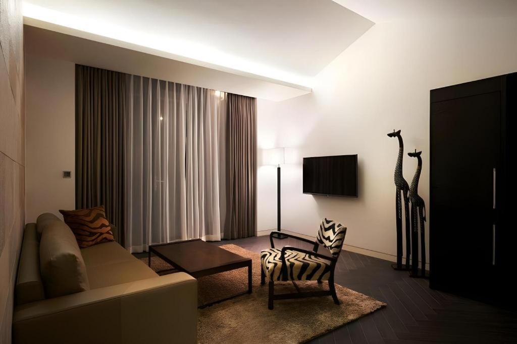 TV a/nebo společenská místnost v ubytování The Classic by Hotelone