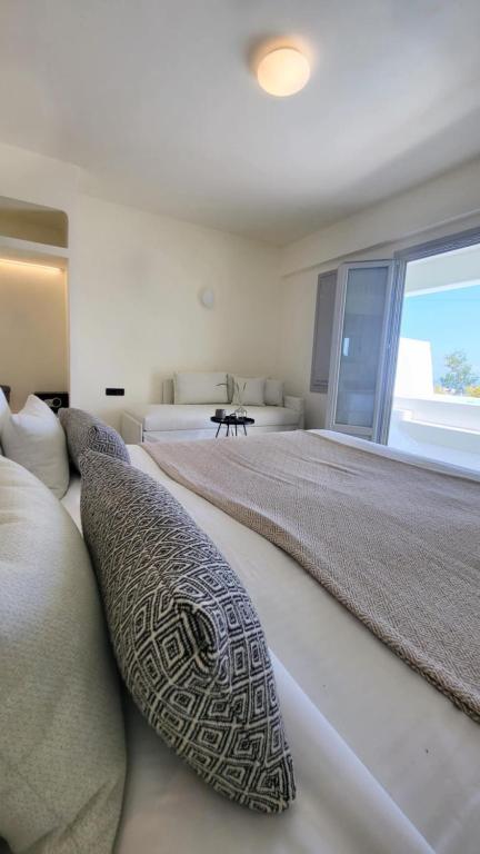 Cama o camas de una habitación en Maeva Suites Santorini