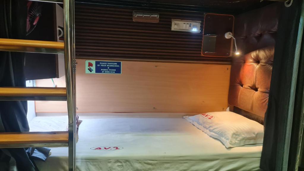 Postel nebo postele na pokoji v ubytování AV Dormitory