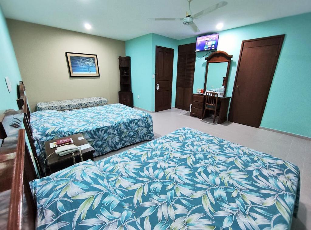 Postel nebo postele na pokoji v ubytování Novotel De Poza Rica