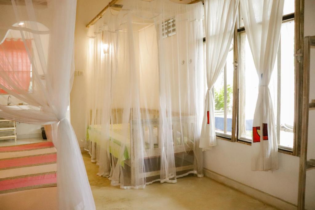 Letto o letti in una camera di Deep Blue
