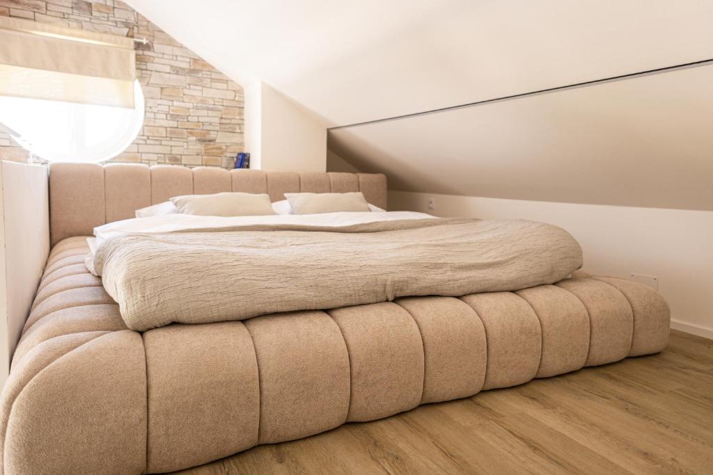 Postel nebo postele na pokoji v ubytování Pálavské Apartmány Original