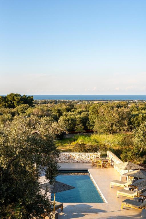 Bazén v ubytování Botanico Villa & Suites nebo v jeho okolí