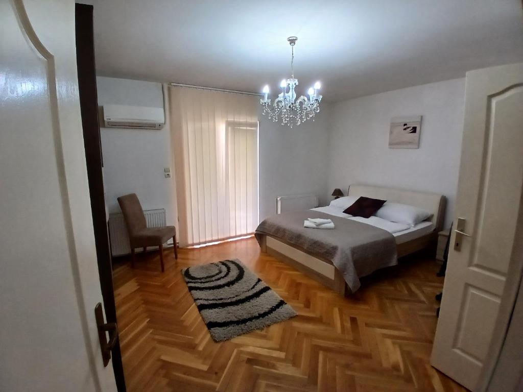 Postel nebo postele na pokoji v ubytování Vila mijajlovic