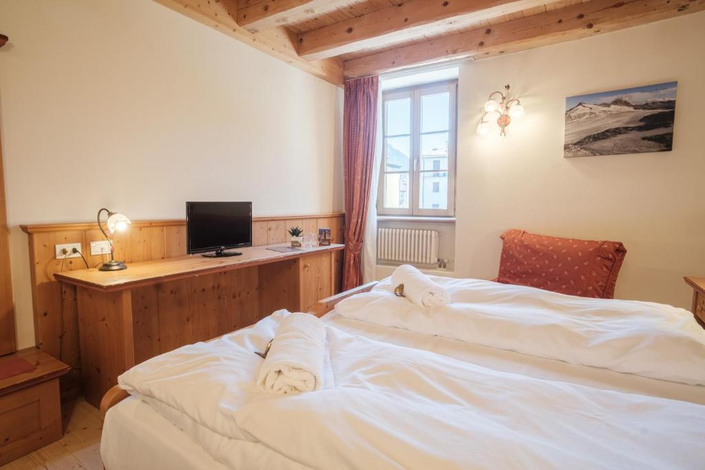 Postel nebo postele na pokoji v ubytování Casa Moresc