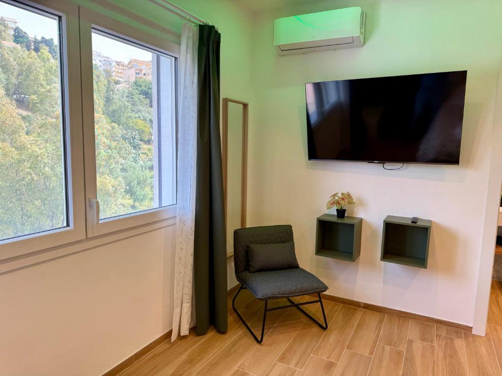 Televízia a/alebo spoločenská miestnosť v ubytovaní Liu' al viale