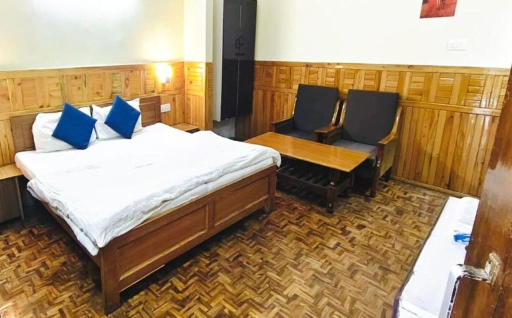 Postel nebo postele na pokoji v ubytování Sukoon Nainital