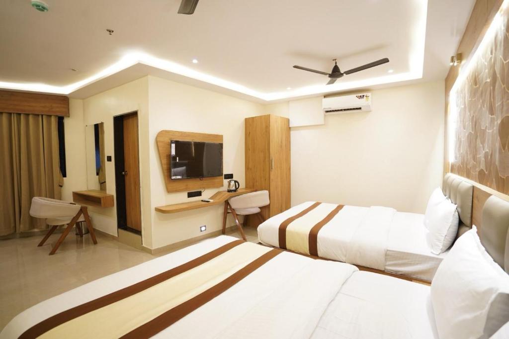 TV a/nebo společenská místnost v ubytování Hotel Lancaster