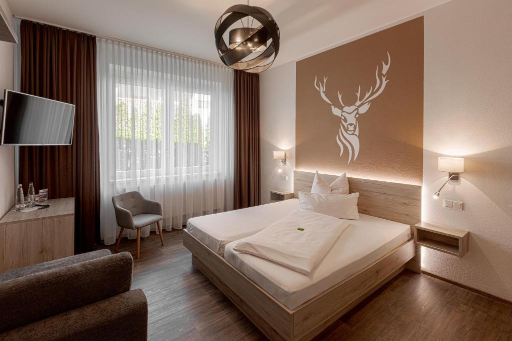 Postel nebo postele na pokoji v ubytování Hotel Kitz ehemals Schlemmerhütte