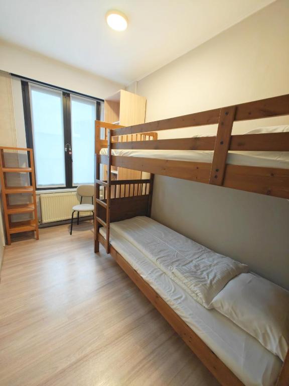 Postel nebo postele na pokoji v ubytování Hotel Tropicana