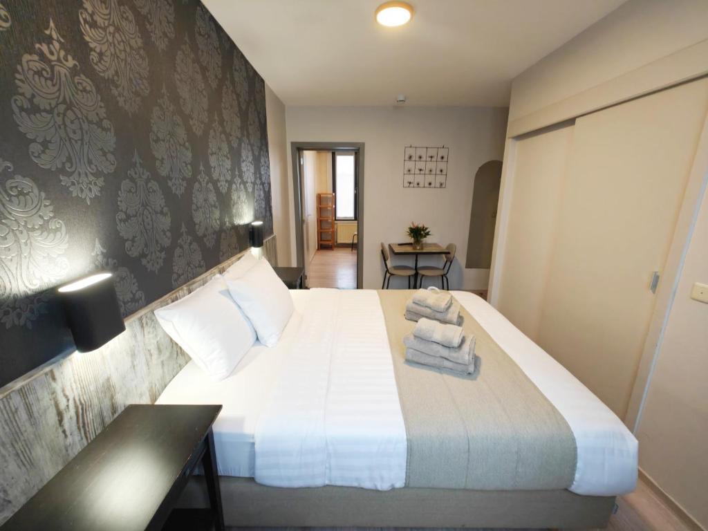 Postel nebo postele na pokoji v ubytování Hotel Tropicana