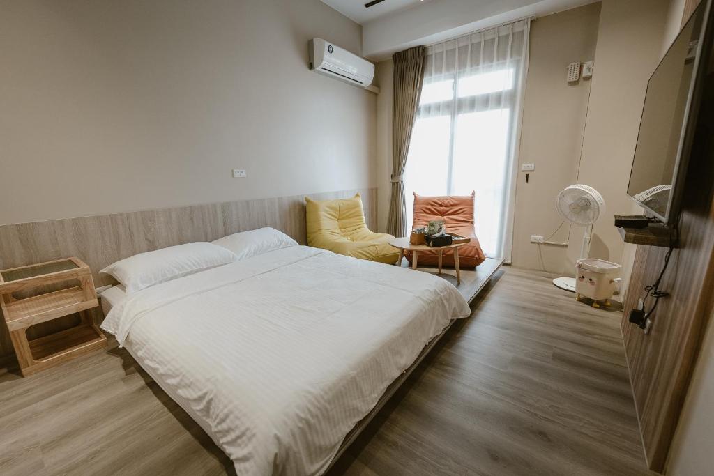 Postel nebo postele na pokoji v ubytování Shan Hai Yun Jian