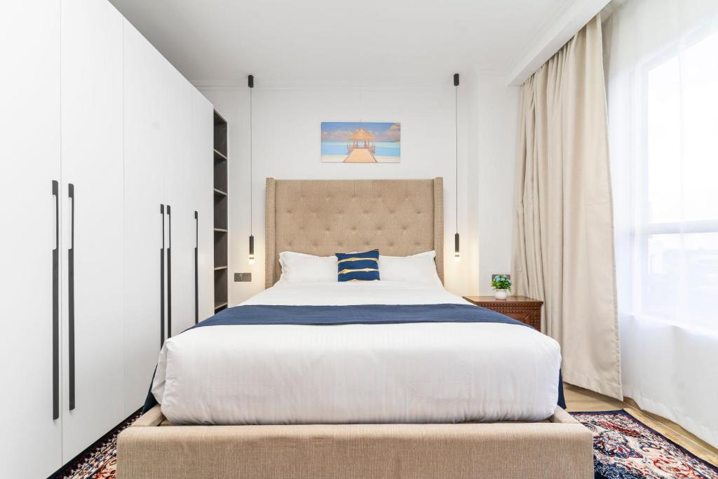 Postel nebo postele na pokoji v ubytování 2 bedroom Marina Bay Square Apt Westland's Nairobi, Kenya