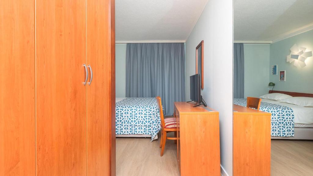 Krevet ili kreveti u jedinici u objektu Amadria Park Beach Hotel Niko
