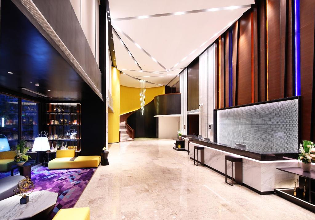 TV a/nebo společenská místnost v ubytování Hampton by Hilton Shanghai Hongqiao NECC
