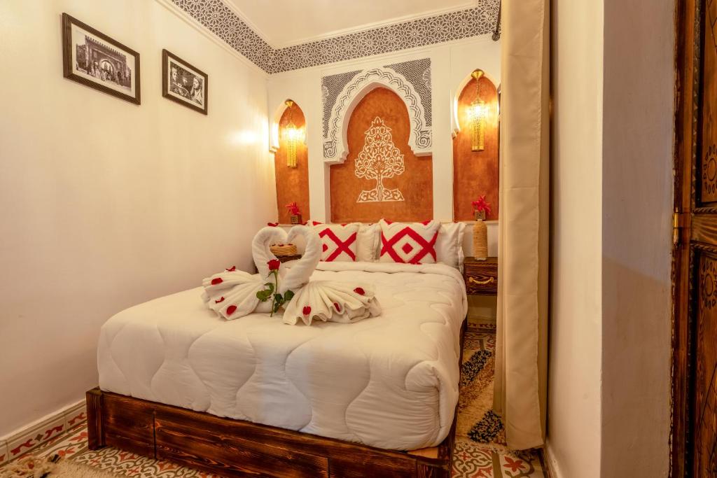 Postel nebo postele na pokoji v ubytování Riad La Perle Bleue Marrakech