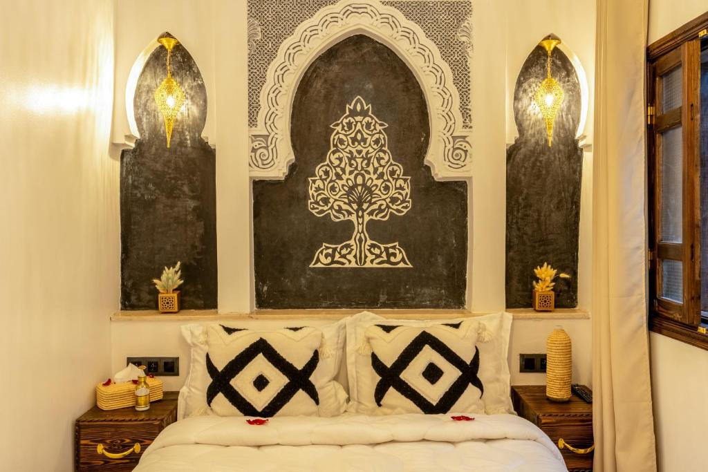 Postel nebo postele na pokoji v ubytování Riad La Perle Bleue Marrakech