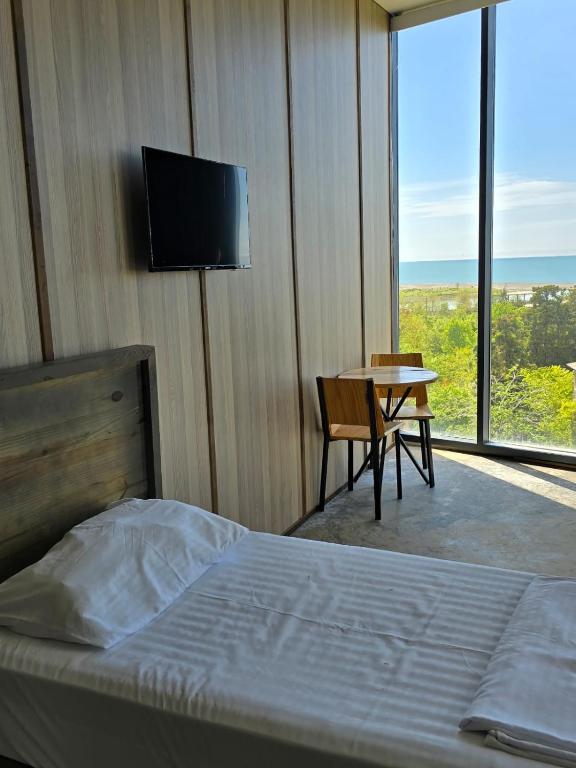 Postel nebo postele na pokoji v ubytování Comfortium