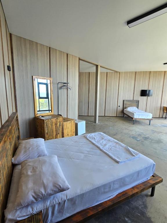 Postel nebo postele na pokoji v ubytování Comfortium