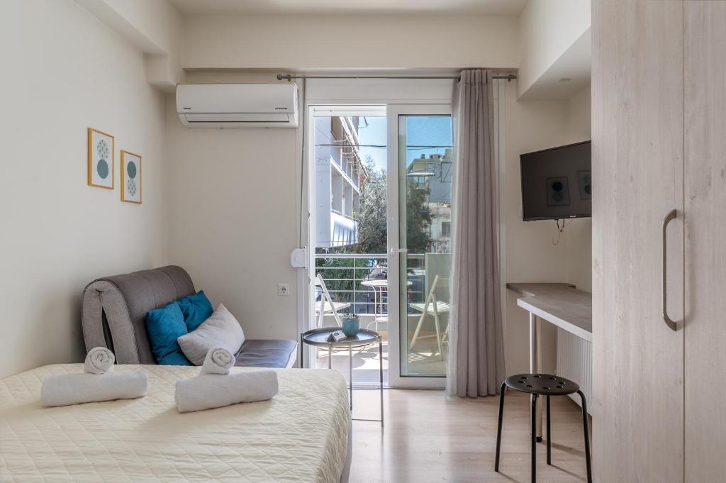 A bed or beds in a room at Elvita Apartments 3
