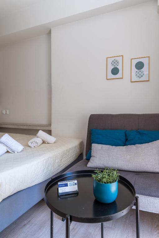 A bed or beds in a room at Elvita Apartments 3