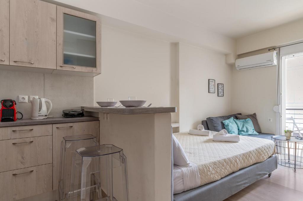 A bed or beds in a room at Elvita Apartments 3