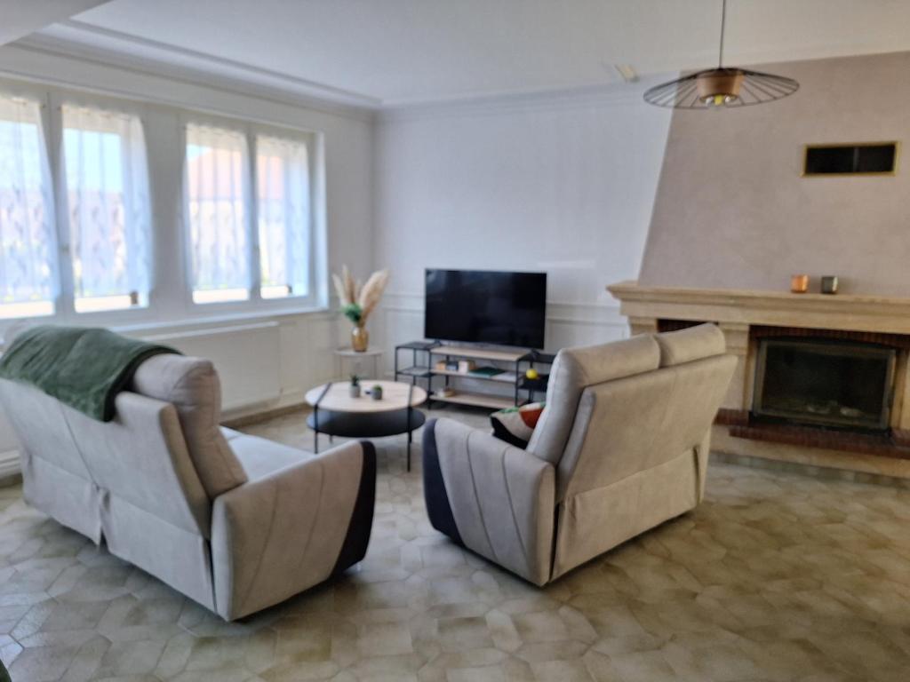 TV a/nebo společenská místnost v ubytování 7Cépages