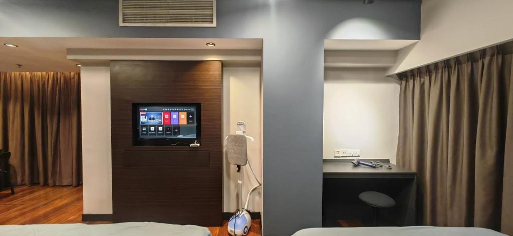 Televisor o centre d'entreteniment de Sunway Resort Suite Linked to Pyramid and Lagoon