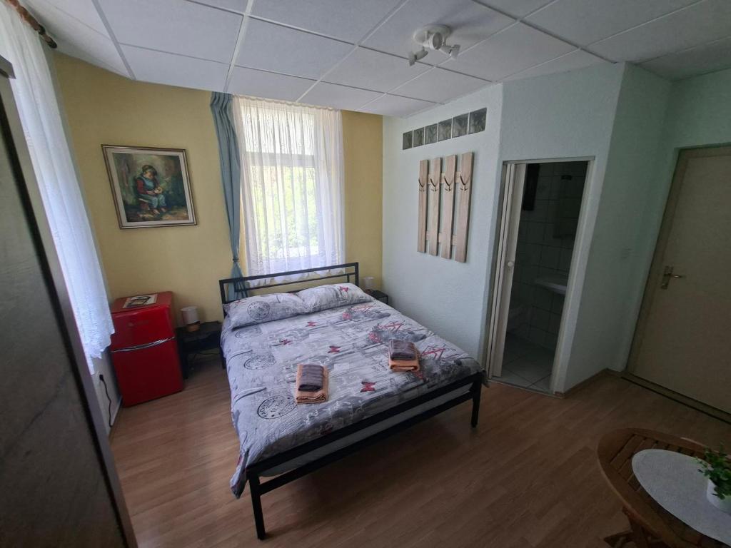 Postel nebo postele na pokoji v ubytování Gostišče Andrejc