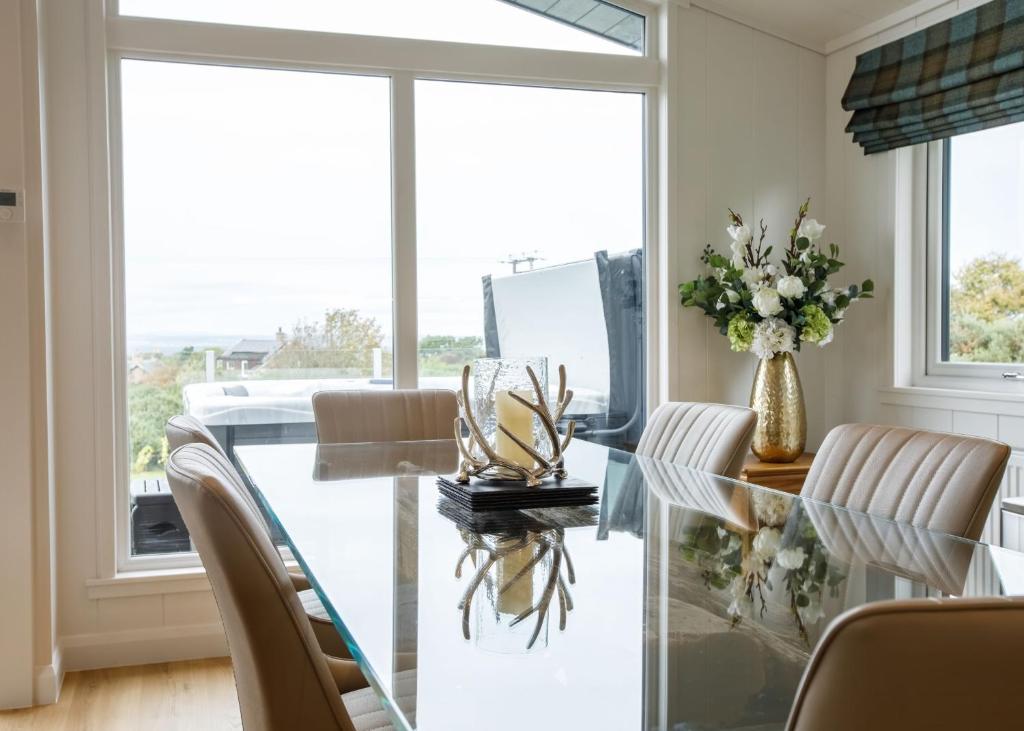 Posezení v ubytování Drumcarrow Luxury Lodges