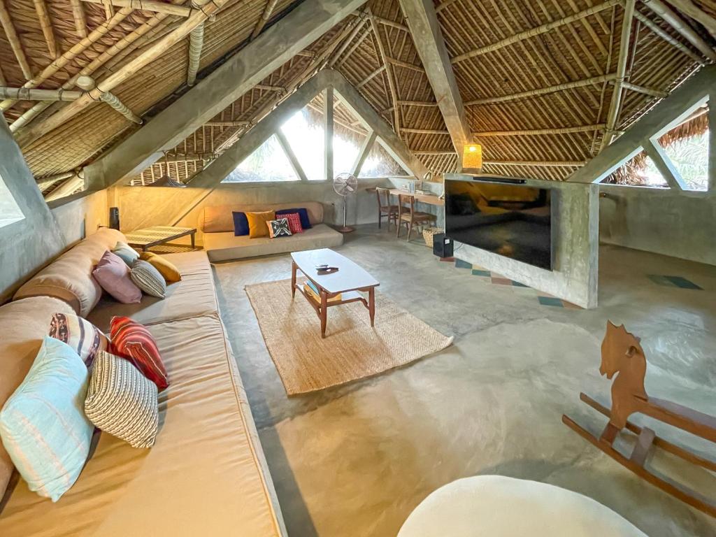 Posezení v ubytování Baia Nest MALASUGI Room within Self-Service Villa Near the Beach