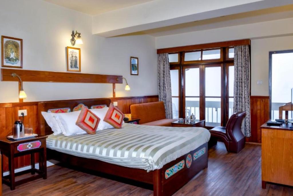 Postel nebo postele na pokoji v ubytování Sonam Delek Gangtok Tibet Road