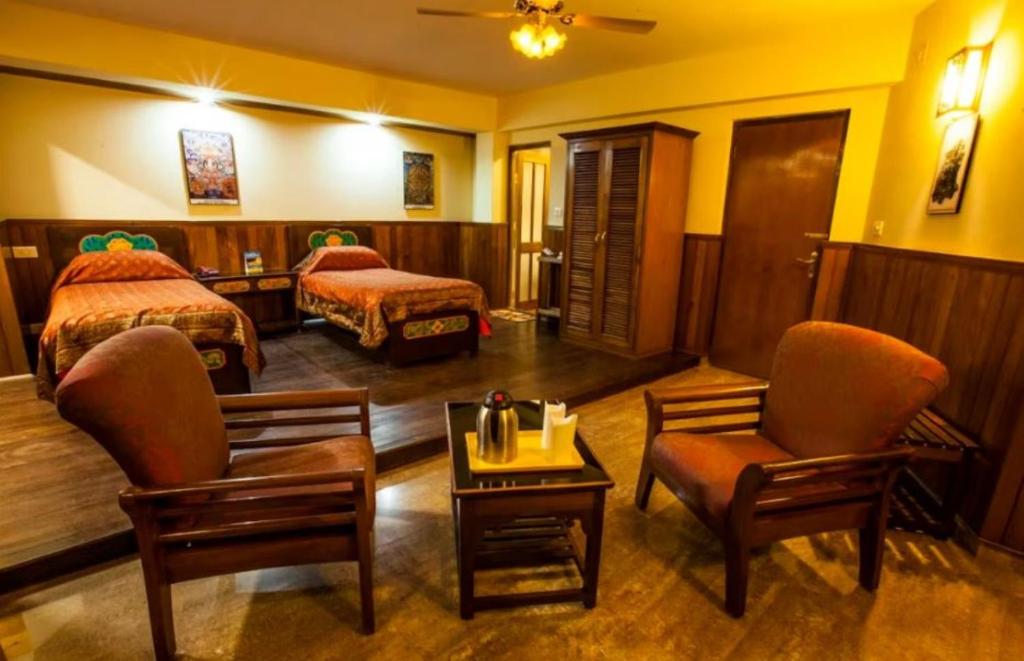 Postel nebo postele na pokoji v ubytování Sonam Delek Gangtok Tibet Road