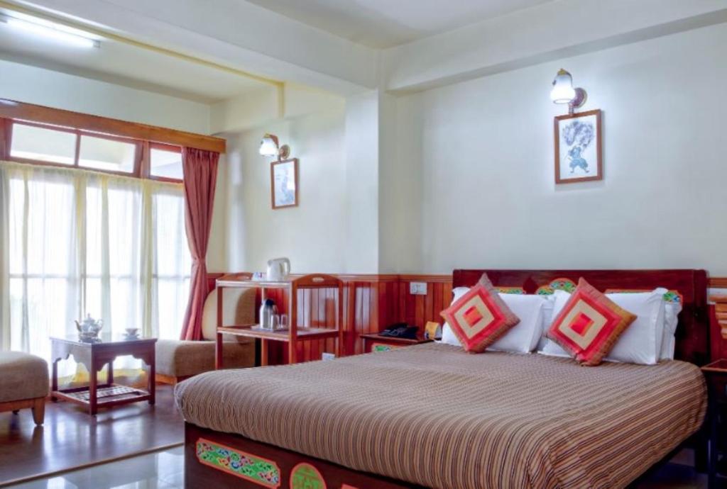 Postel nebo postele na pokoji v ubytování Sonam Delek Gangtok Tibet Road
