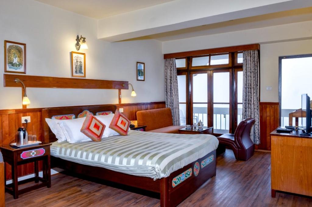 Postel nebo postele na pokoji v ubytování Sonam Delek Gangtok Tibet Road