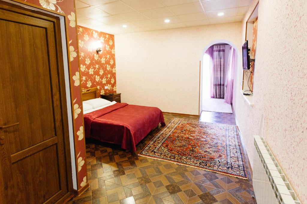 Postel nebo postele na pokoji v ubytování AVAGYAN'S Hotel-restaurant