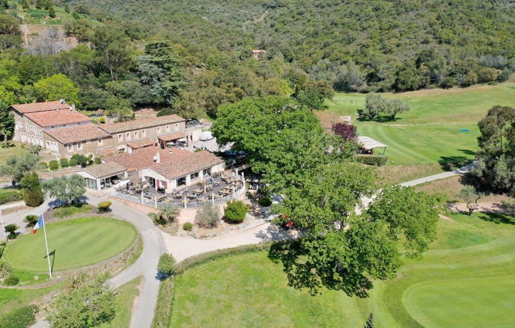 an aerial view of a house with a golf estate at Grand Studio & Terrasse Privée in Hyères