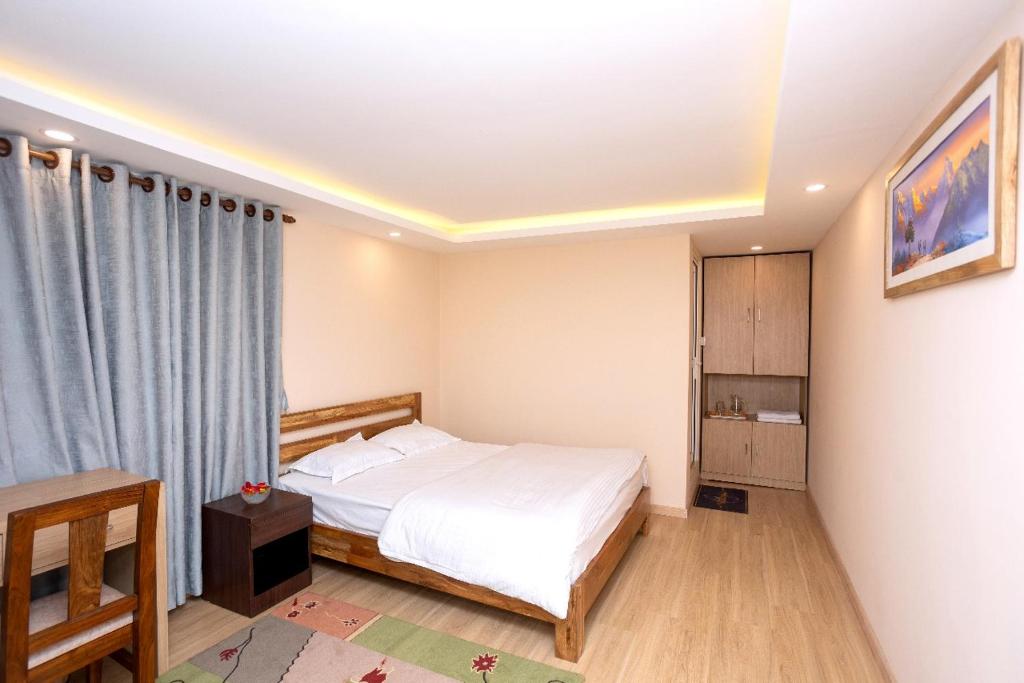 Postel nebo postele na pokoji v ubytování Kathmandu room with great view, like resort
