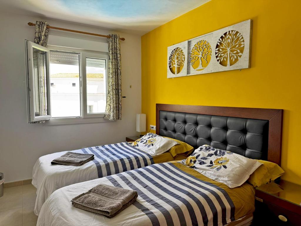 Łóżko lub łóżka w pokoju w obiekcie Apartamento Esencia - Ole Solutions
