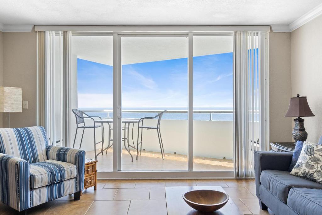 a living room with a view of the ocean at Perdido Sun 1010 in Perdido Key