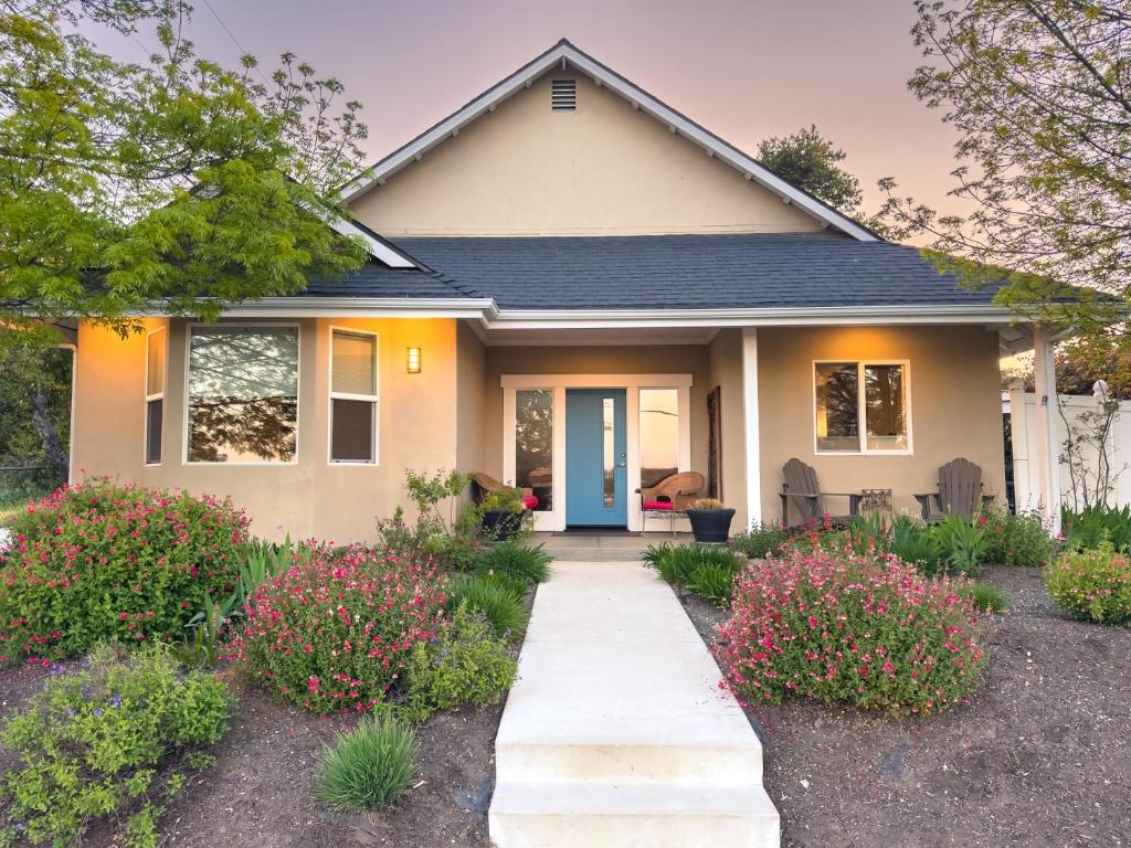 a house with a pathway leading to the front door at Charm on Chestnut in Paso Robles