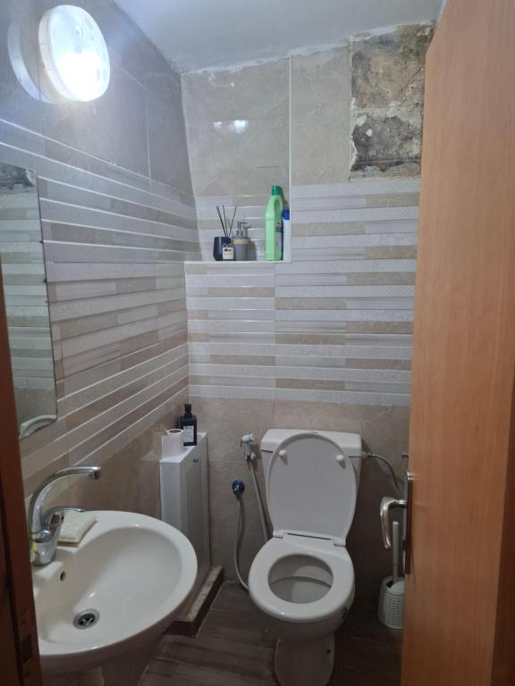 Vannituba majutusasutuses ALKHAWAJAT Guest House