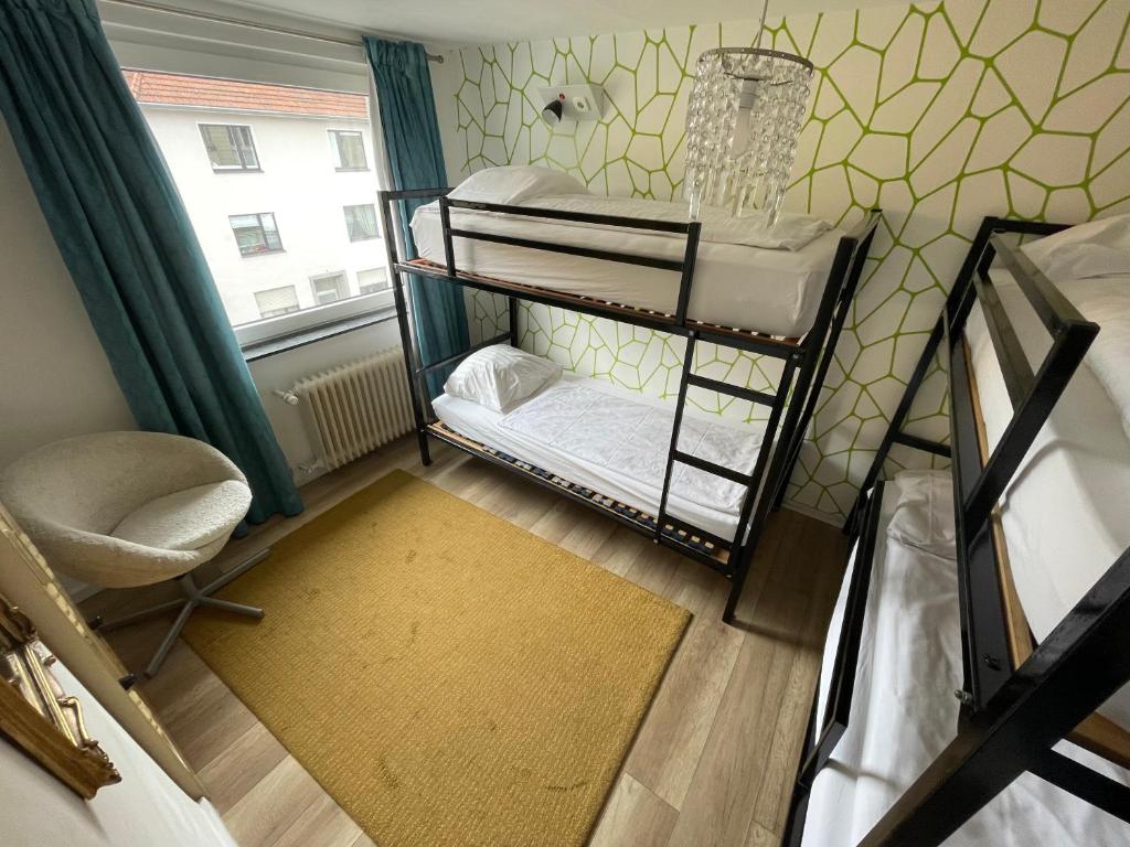 Postel nebo postele na pokoji v ubytování Weltempfänger Backpacker Hostel