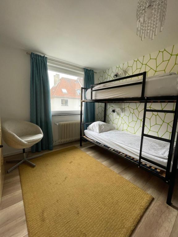 Postel nebo postele na pokoji v ubytování Weltempfänger Backpacker Hostel