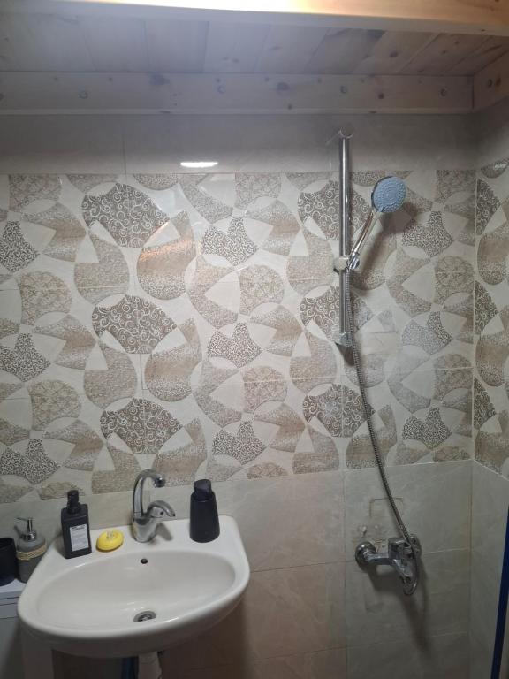 Vannituba majutusasutuses ALKHAWAJAT Guest House