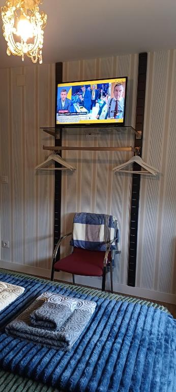 A television and/or entertainment centre at Casa Raposeira