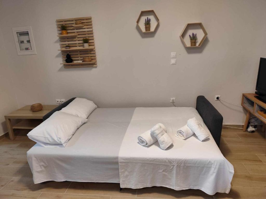 Postel nebo postele na pokoji v ubytování Loris’House