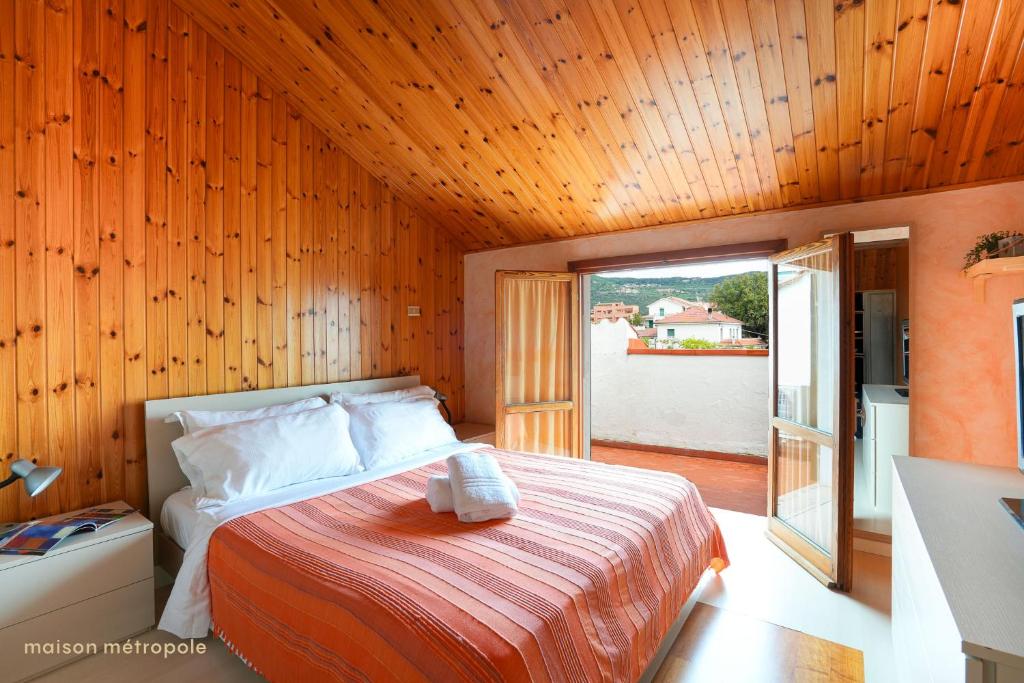 Postel nebo postele na pokoji v ubytování Moresco Apartment