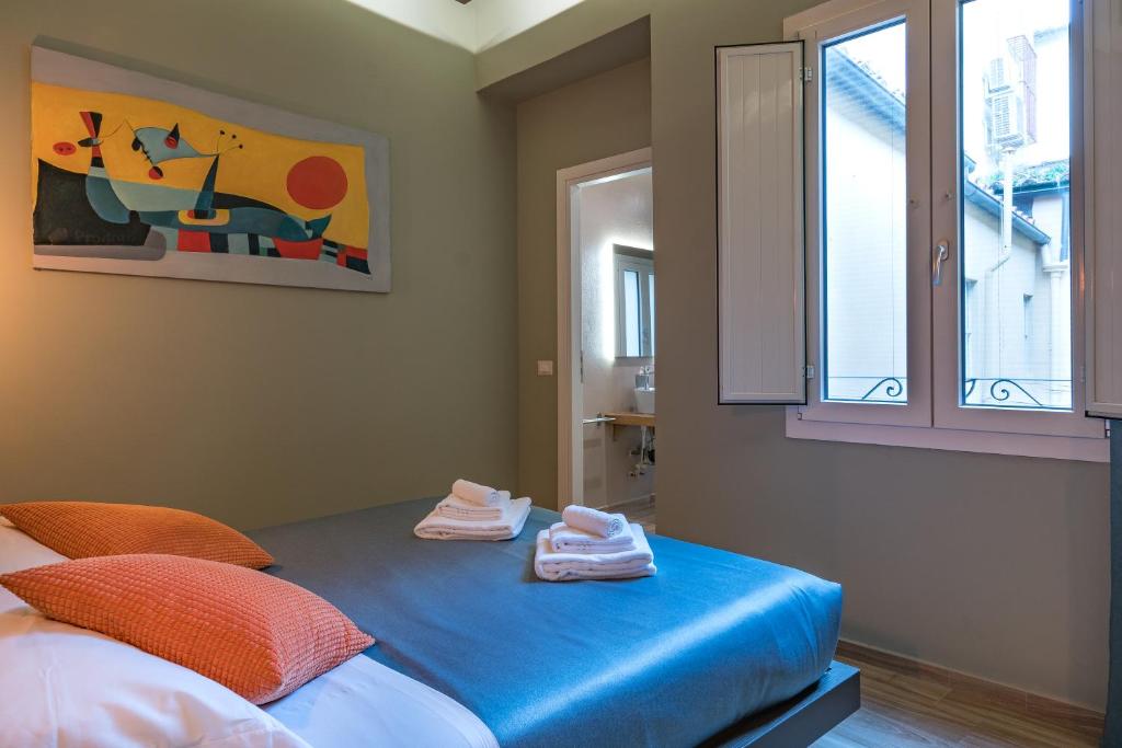 Postel nebo postele na pokoji v ubytování GOGO` Petit Hotel